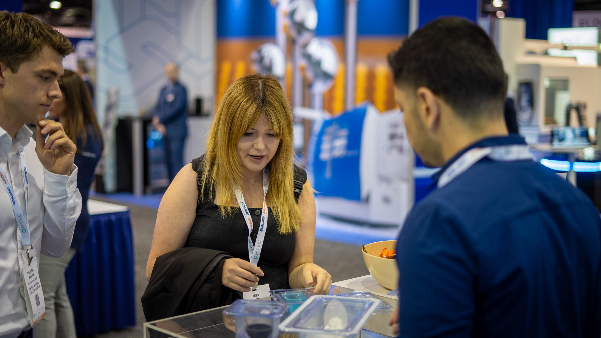 Medical Device Innovator speaking with LSO team member at OMTEC 2025 booth