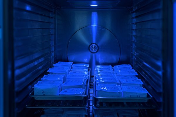 Inside a gamma sterilization chamber with packaged medical devices undergoing sterilization.