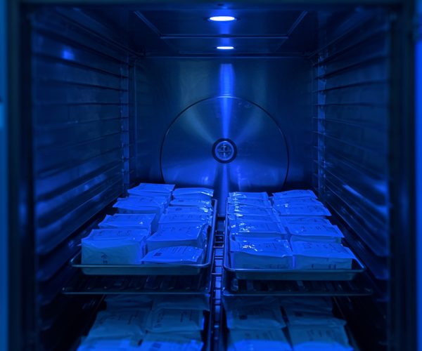 Inside a gamma sterilization chamber with packaged medical devices undergoing sterilization.