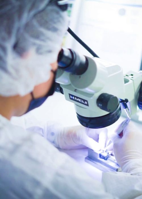 Medical Device Assembly – Life Science Outsourcing Technicians working in a sterile cleanroom assembling medical devices, representing LSO’s full-service manufacturing capabilities.